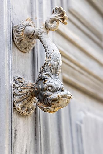 Aigues-Mortes-Gard-Occitania-France Old door knocker in the shape of a fish Art Print